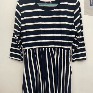 a striped shein dress, size large. it has pockets.